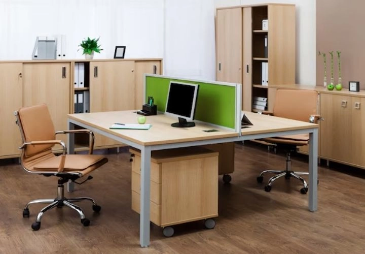 Office workstation desk with green divider