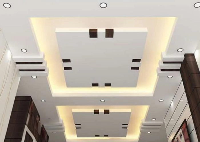 Living room with 3D geometric false ceiling patterns