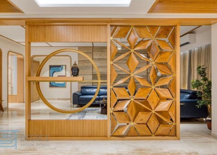 Tall wooden wall separating entrance from living area.