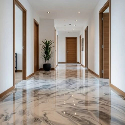 Smooth glossy grey self-leveling epoxy floor.